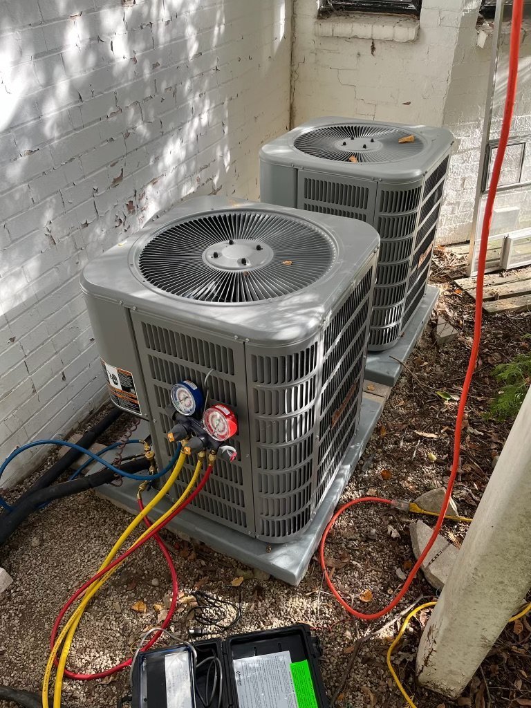 Northstar HVAC/R technician inspecting residential equipment